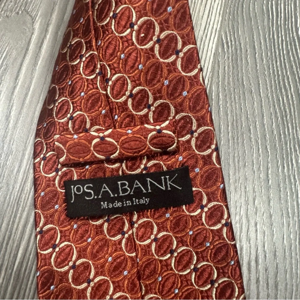 Jos. A. Bank Rust Orange Silk Tie Italy Made Yellow Geometric Circle Pattern 59”